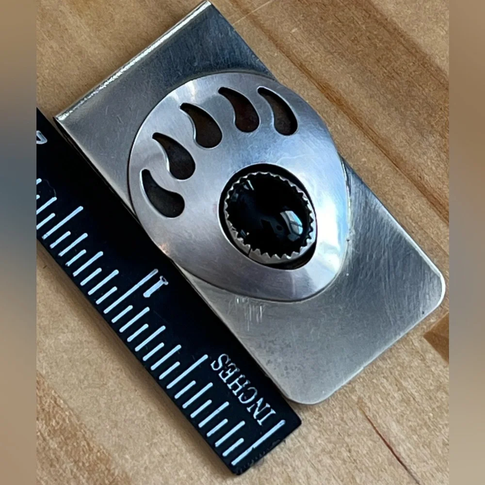 Vintage Silver and onyx shadow box bear paw money clip. Clip is 2” x 1”.